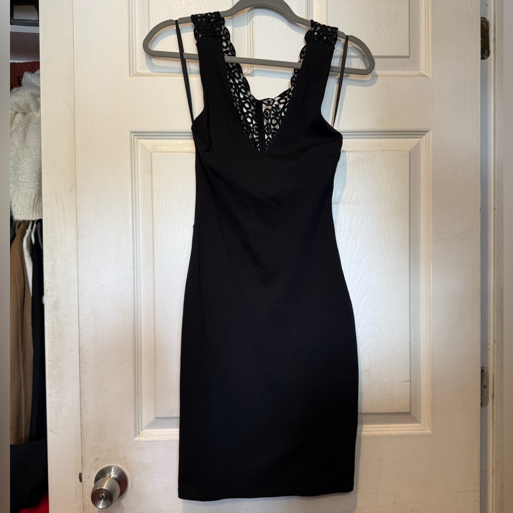 Bebe little black dress with eyelet straps and back xxs